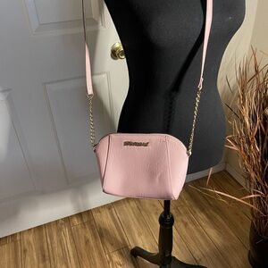 Betsey Johnson women's Crossbody bag that is pink in color